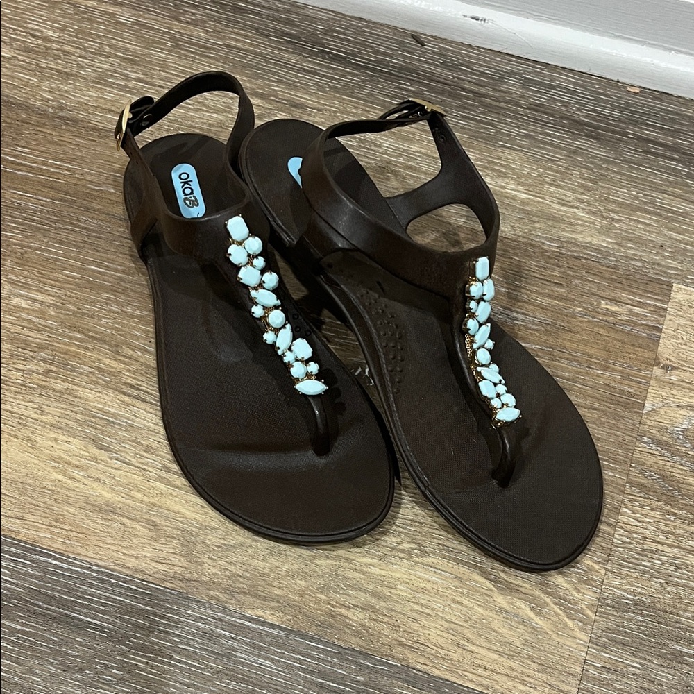 OkaB Black Sandals with Blue Embellishments